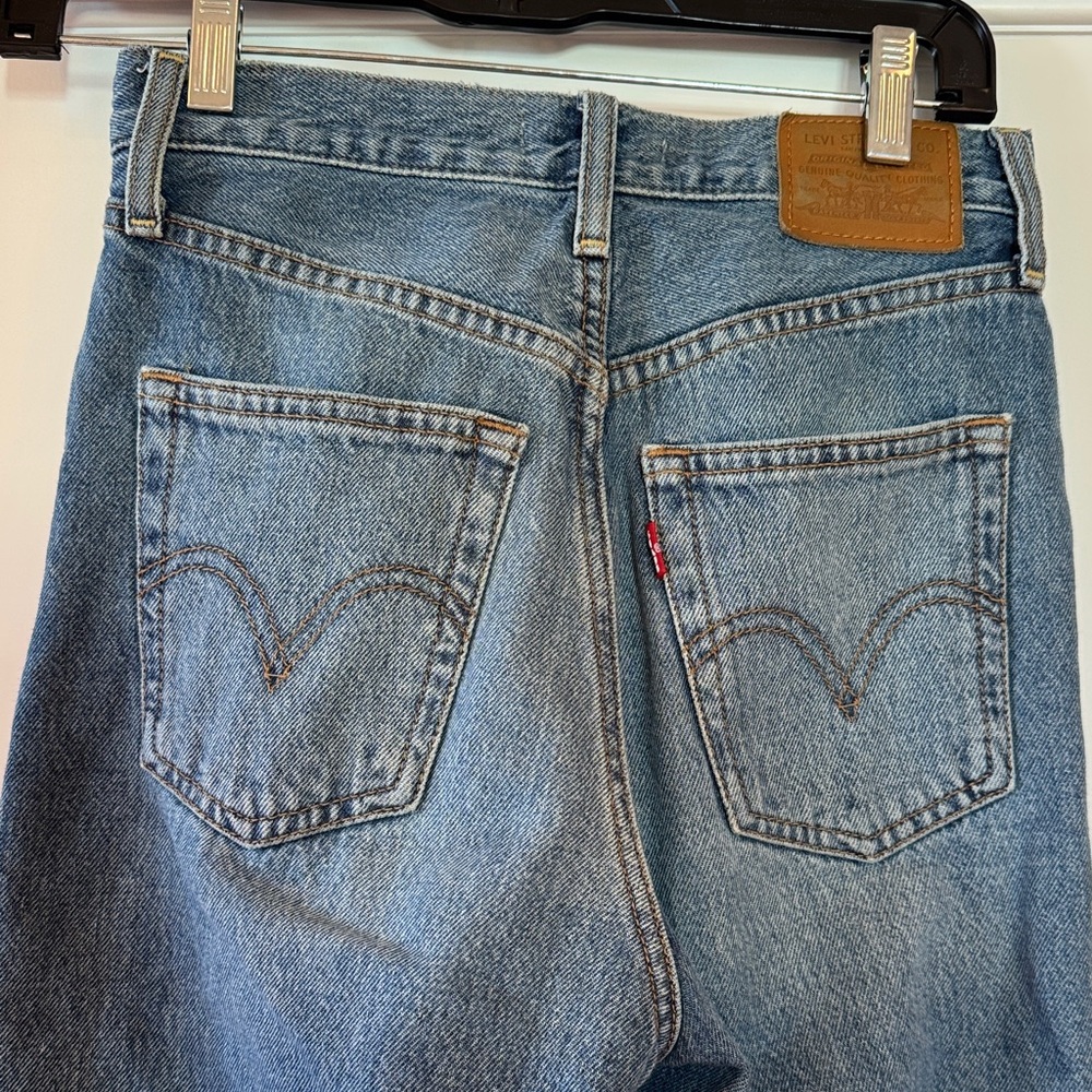 Levi's Blue Denim Jeans - women’s rib cage wide leg, size 24